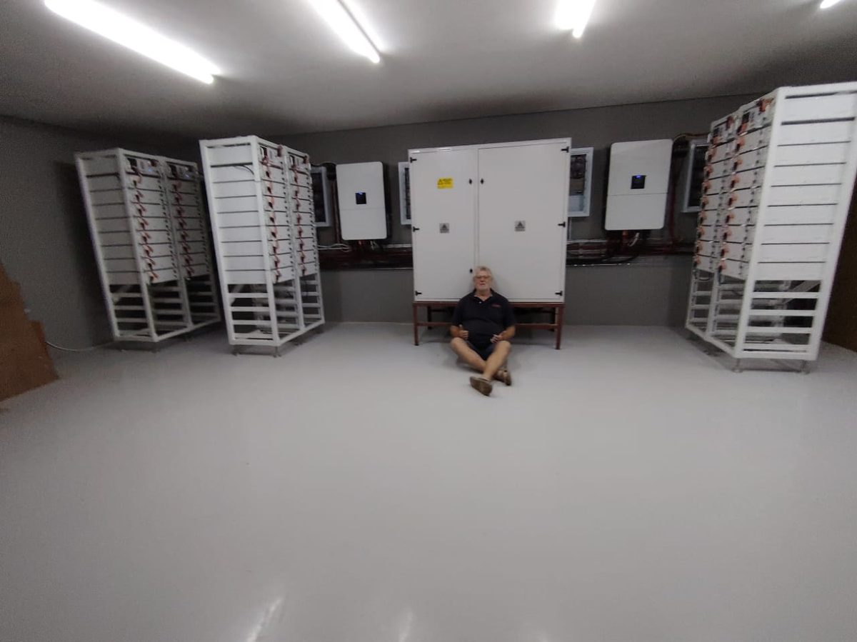 Andre in the Zambia 240kW Deye battery room